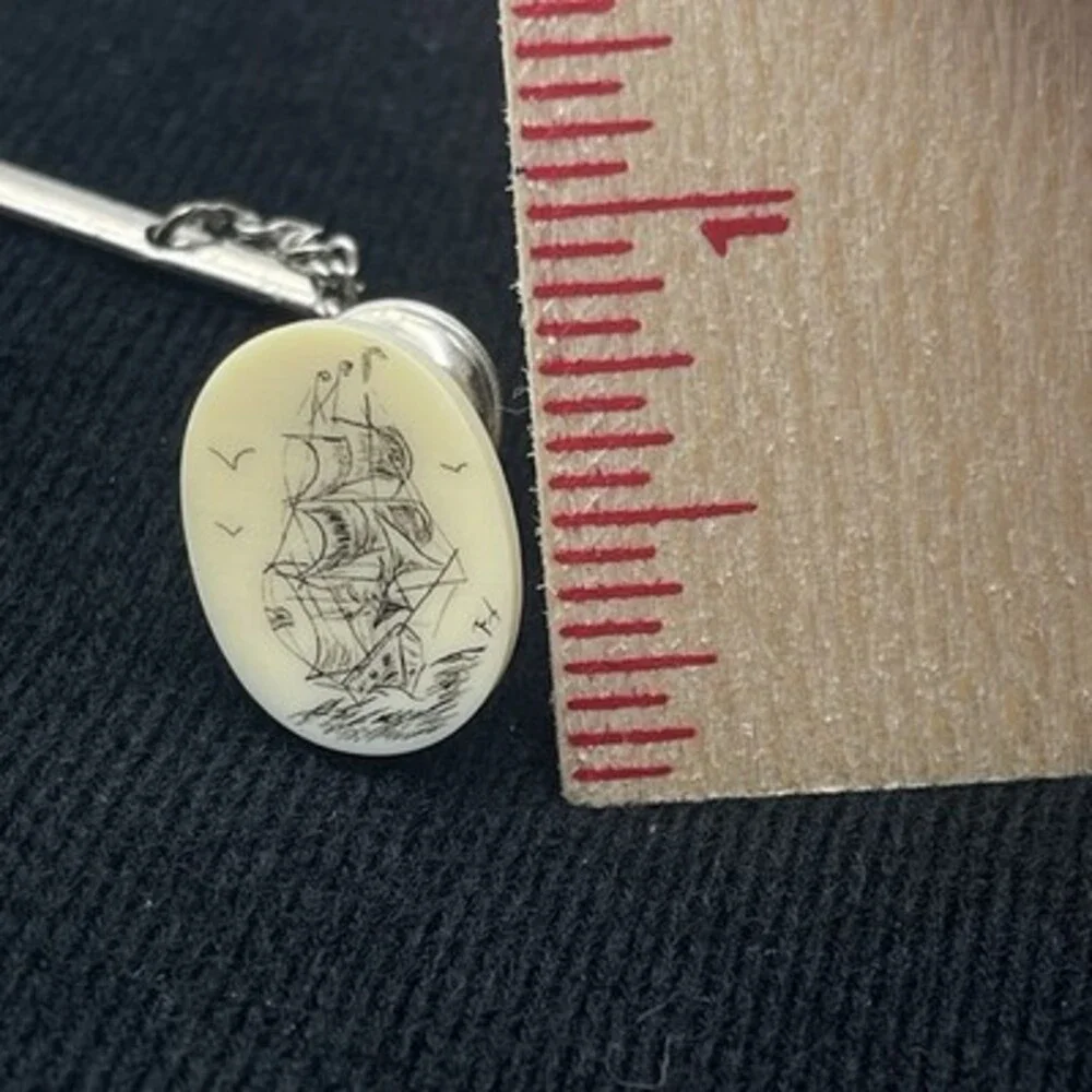 2 VTG scrimshaw tie tacks featuring a detailed nautical Sailboat And Lighthouse